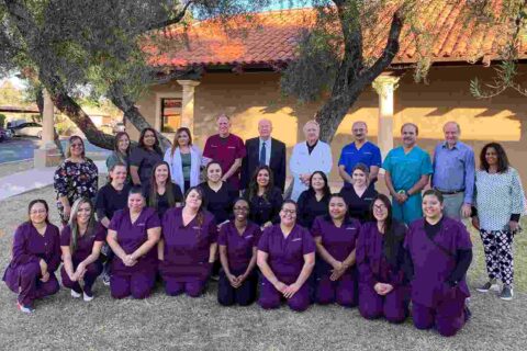 group of doctor sitting for photo