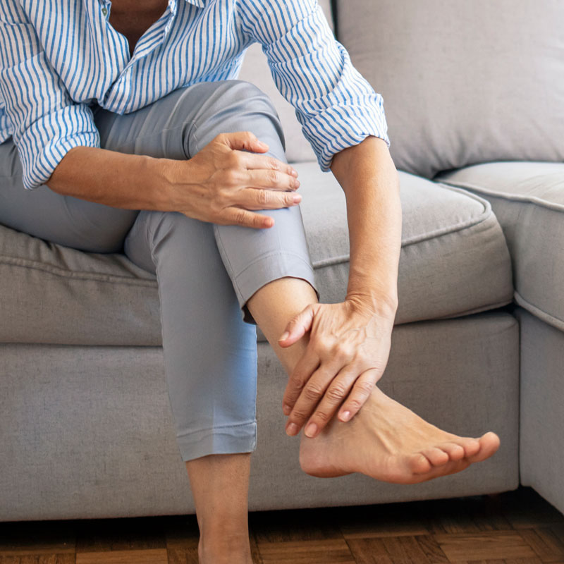 lady hold her foot
