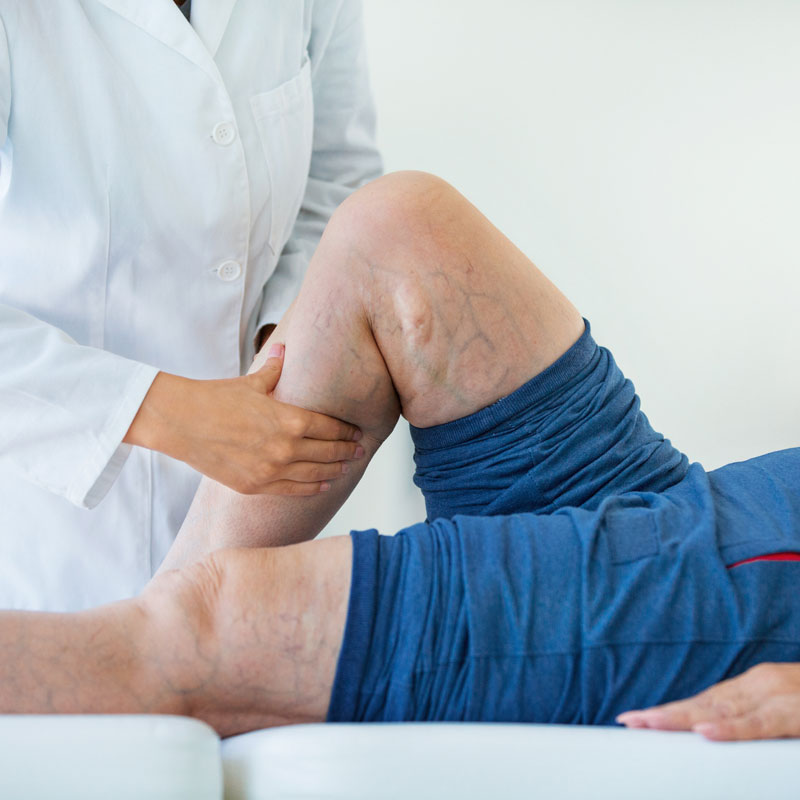 A doctor checking the Arterial Wound of a patient at Arizona Vein & Laser Institute in Phoenix.