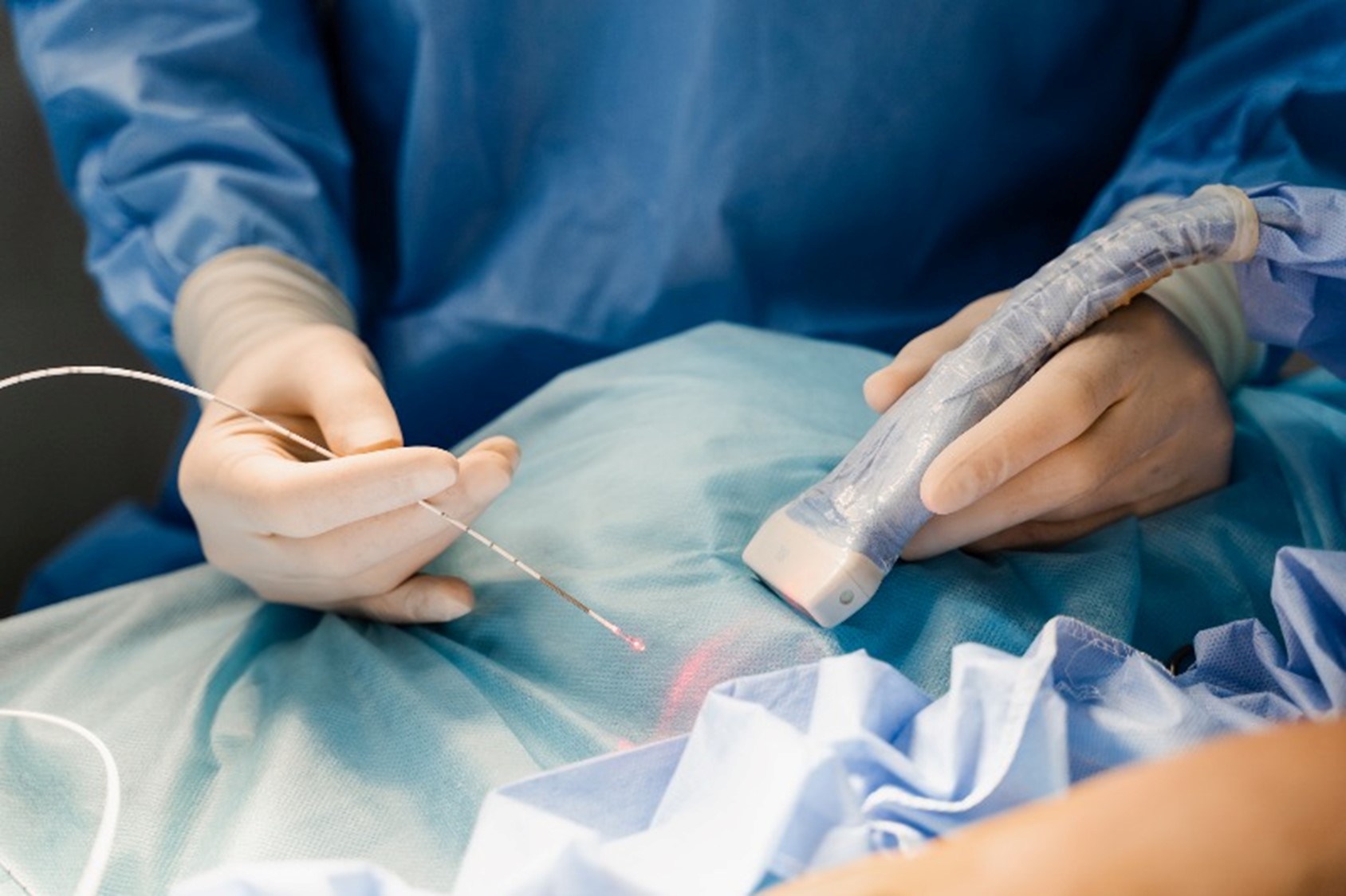 A woman touching her leg after sclerotherapy by Arizona Vein & Laser Institute