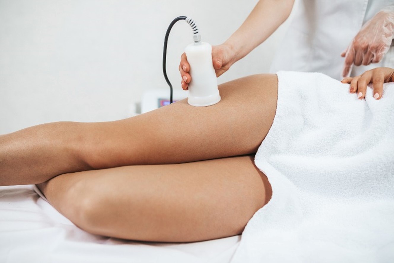 A woman getting a vascular ultrasound on her leg by Arizona Vein & Laser Institute